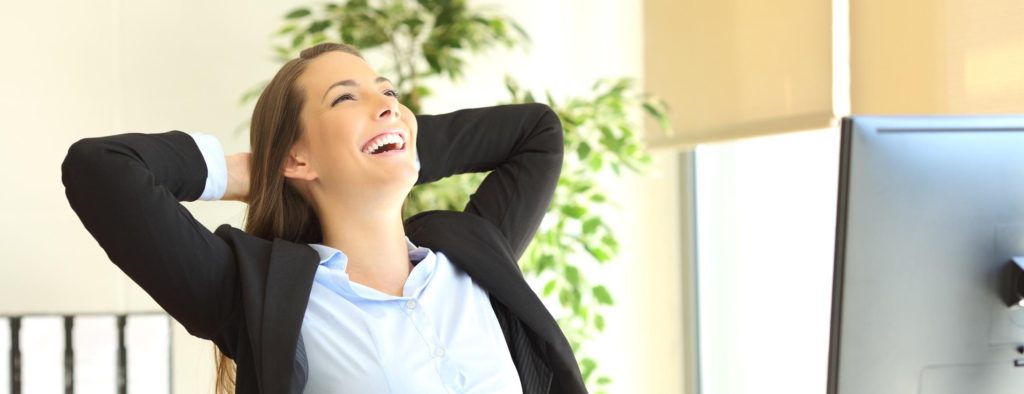 worker smiling leaning back